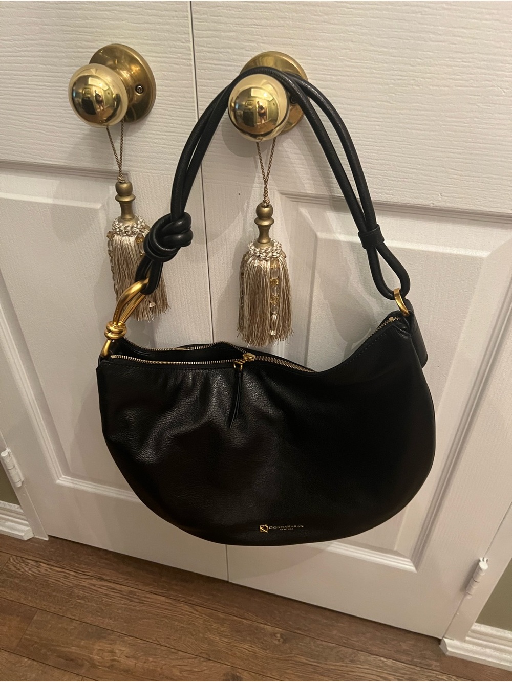 Donna Karan luxury Black Leather Shoulder Bag with Gold Accents. Never Used.